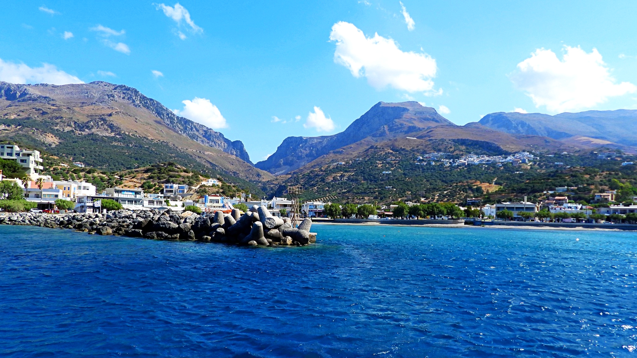 Plakias - The Plakias pier, with in the background the Kotsifou gorge