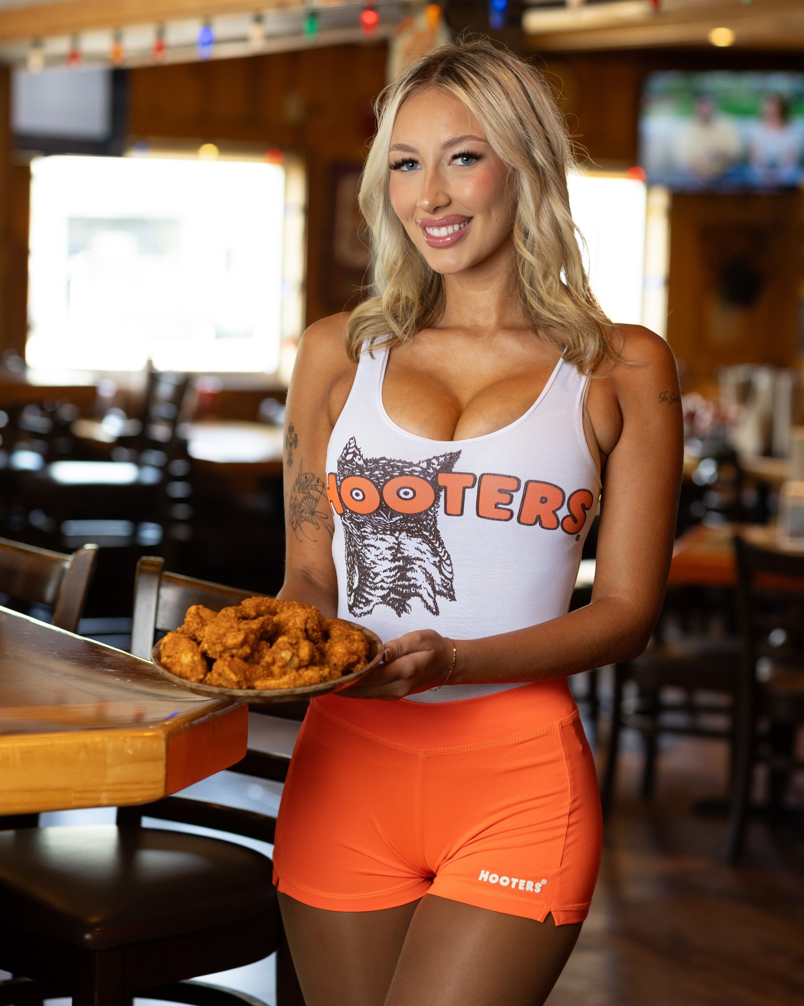 Hooters - 40 years of iconic orange shorts and even more iconic