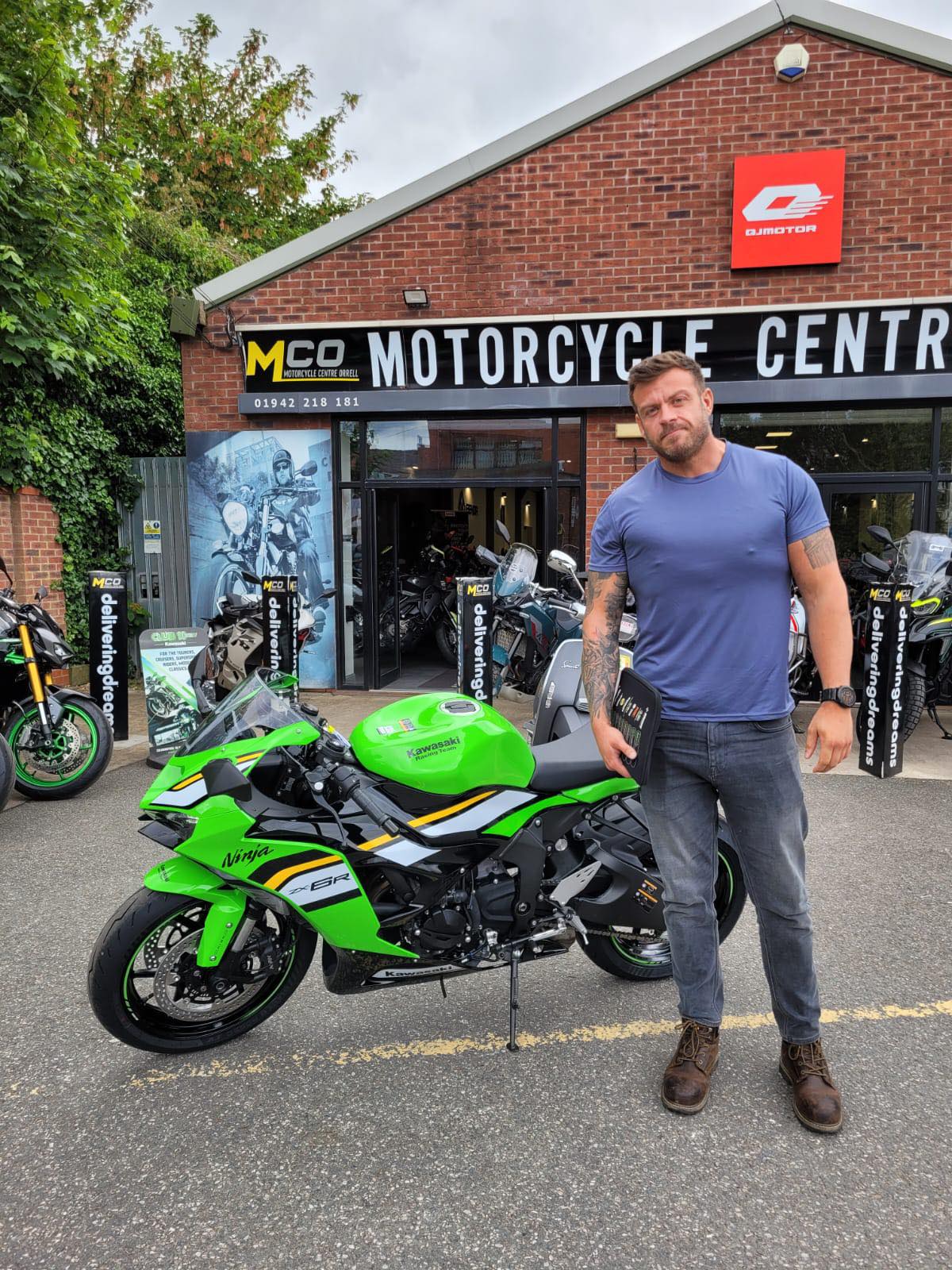 Matthew Chrich collecting his new Kawasaki Ninja ZX6R from Nigel