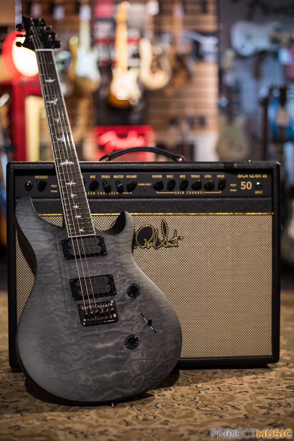 Mark Holcomb signs special PRS SE model guitars