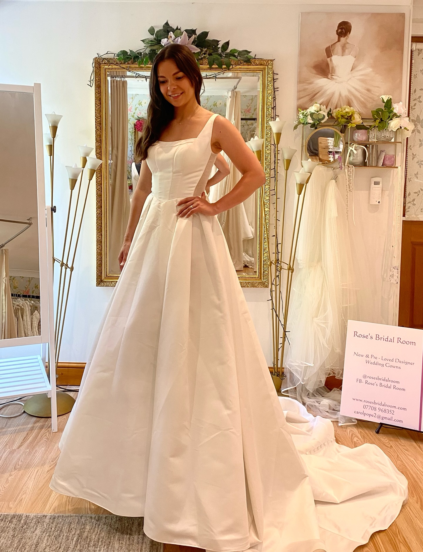 This gorgeous Richard Designs gown has been a hit since it landed in the boutique and it's clear why! With a beautiful full ballgown skirt, square neckline and illusion cutouts, we just