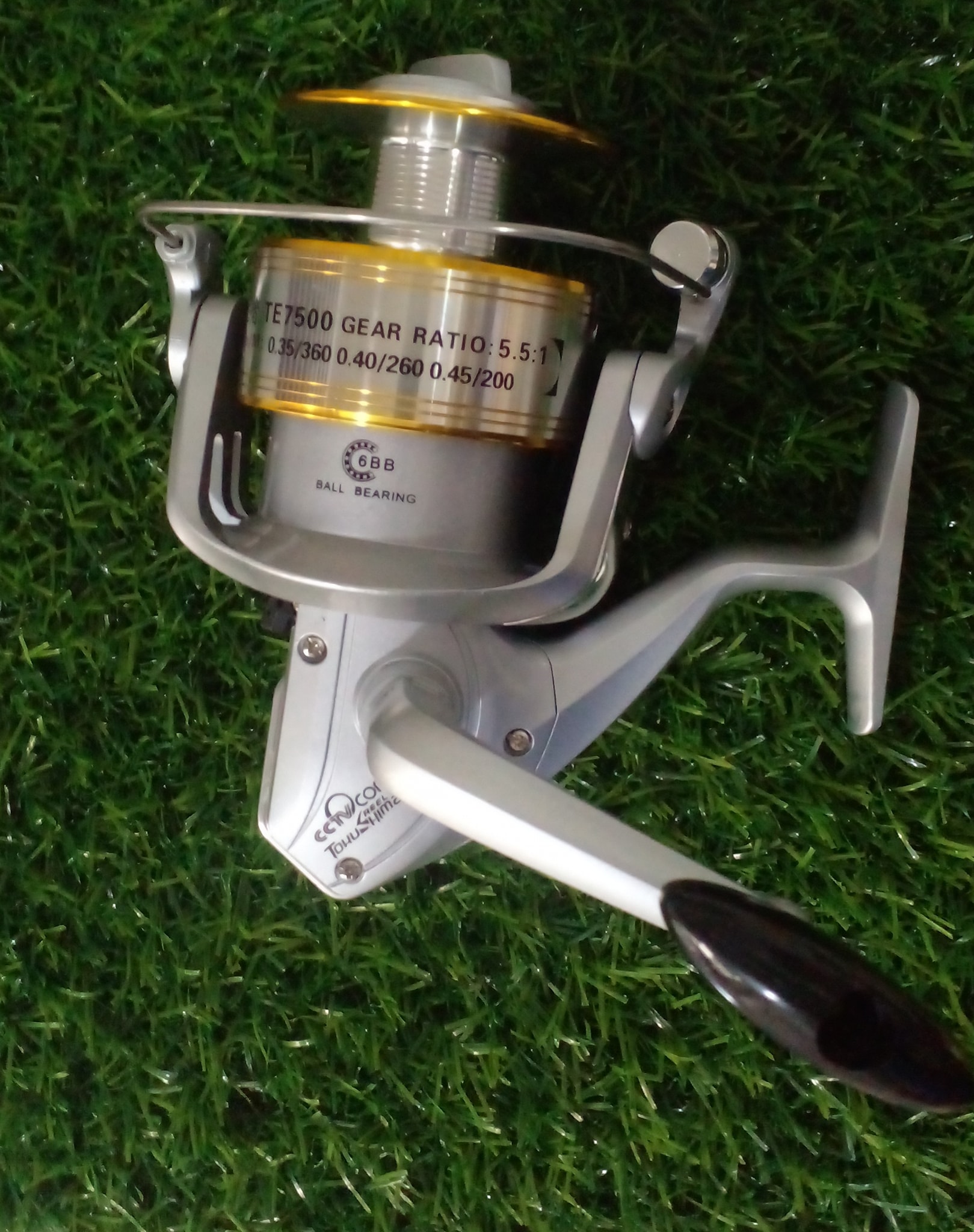 tsunami bait system reel Barrier II Spinning TSBARII8000 while the CF3 sealed Spectra Line Model:50 lb Green (≤ 500 Yards) Gift for guys Lew's Tournament Pro G