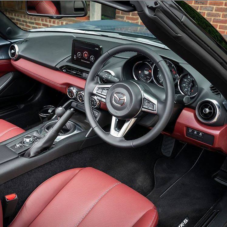 Magna Mazda - A classic Burgundy Nappa leather interior,...