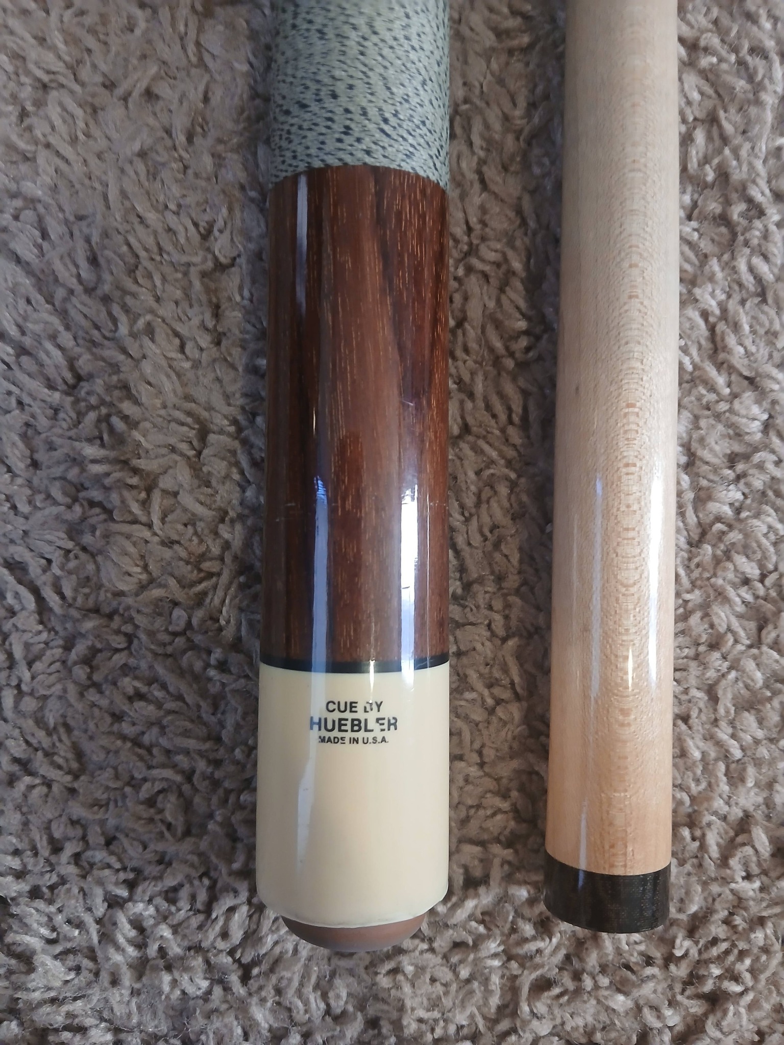 What are Huebler pool cues' models and values?