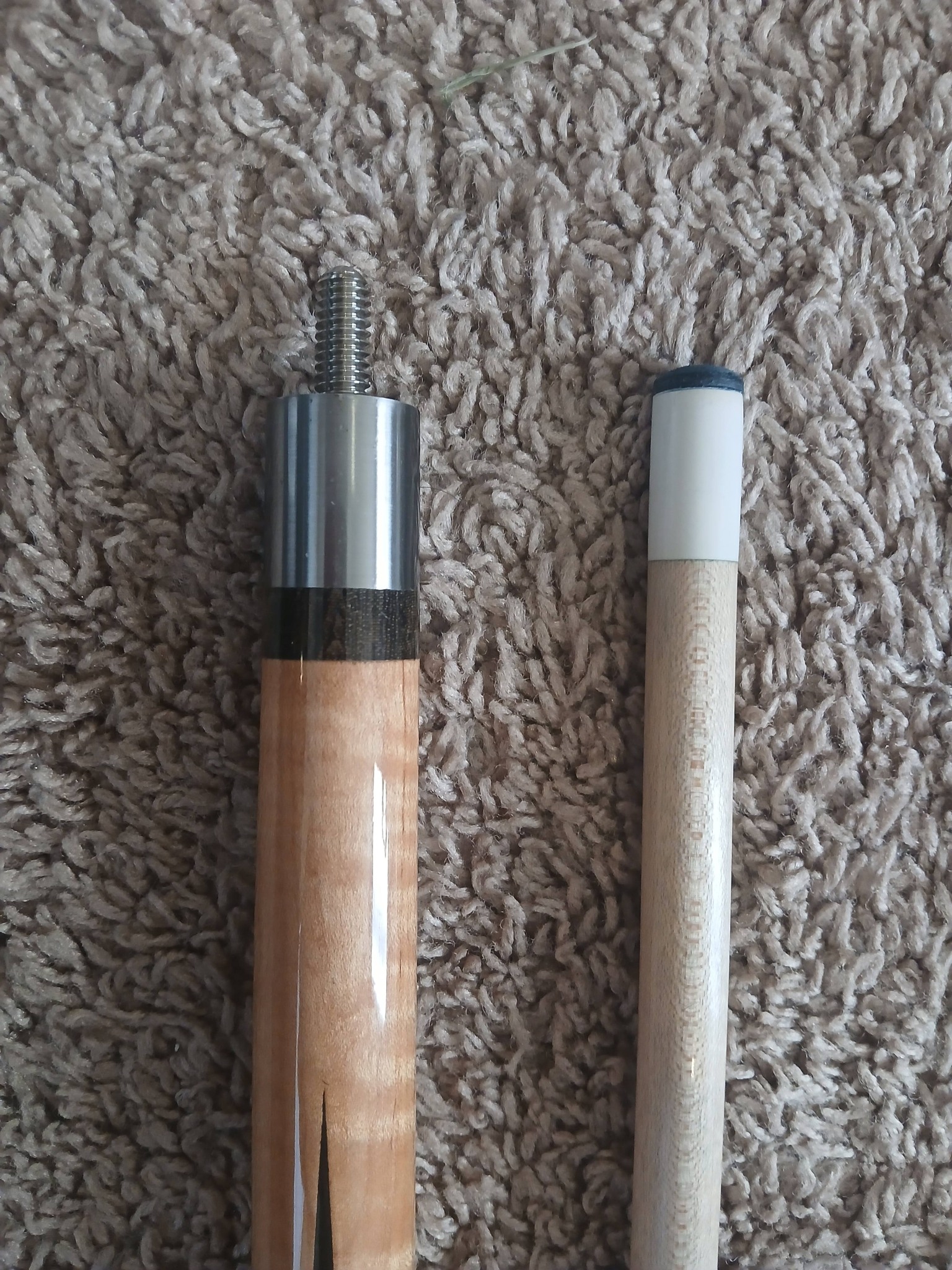 What are Huebler pool cues' models and values?