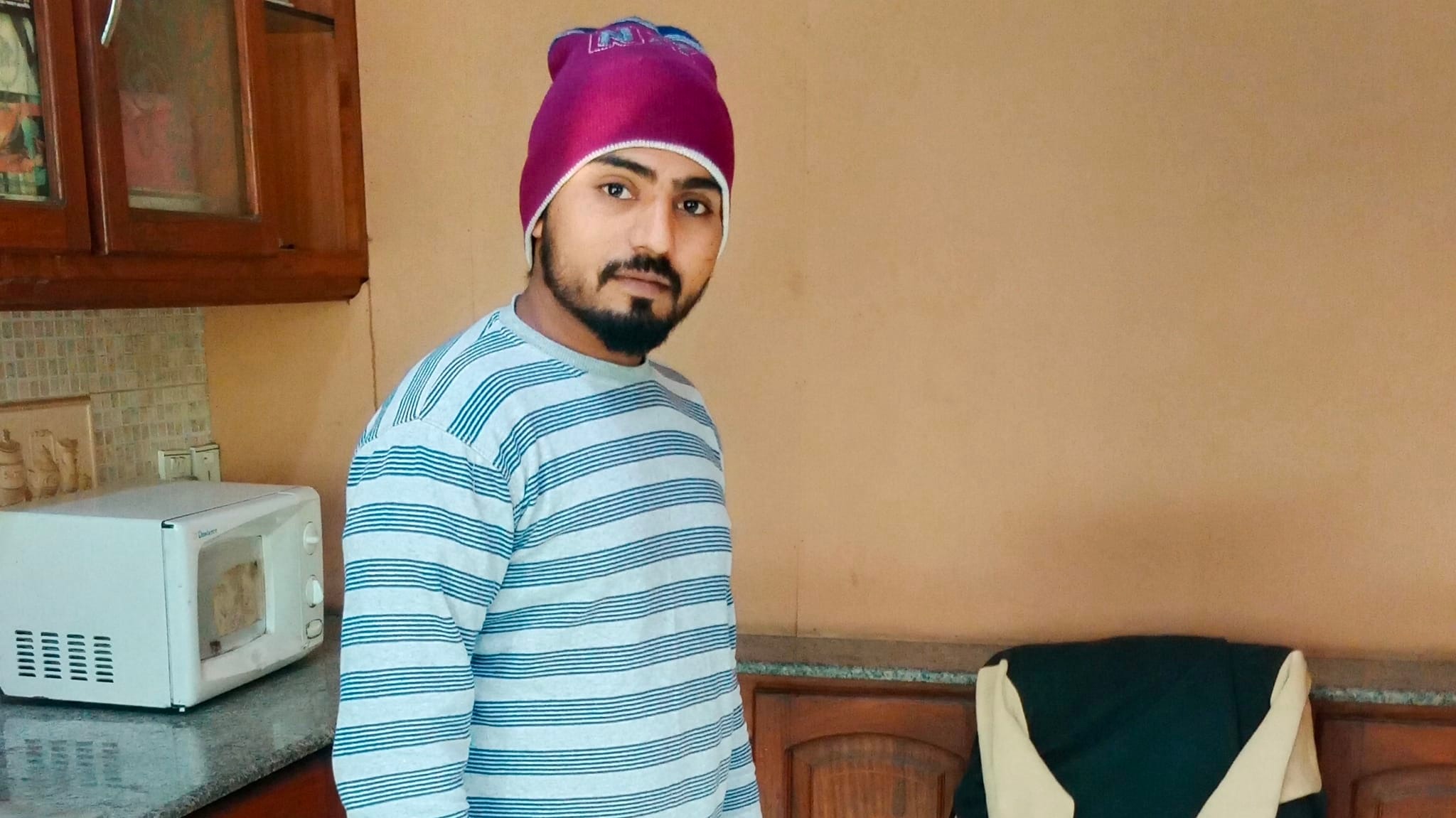 Malik Inam i12