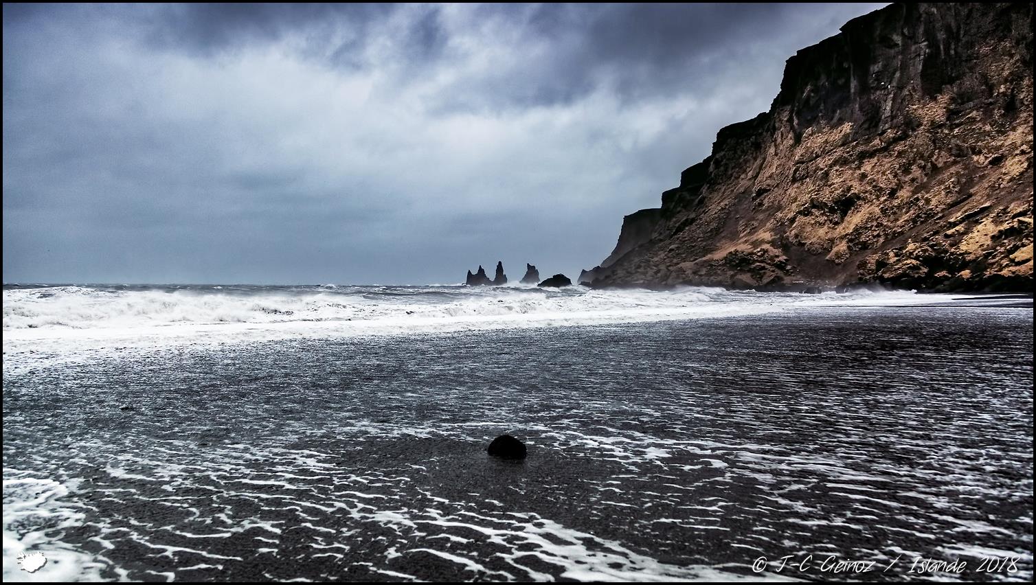 Big storm on the black sand beach of Vik / Iceland March 2018