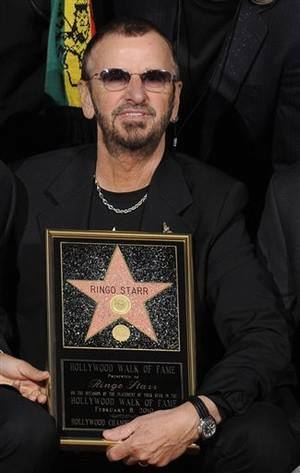 The Beatles receive a star on the Hollywood Walk of Fame