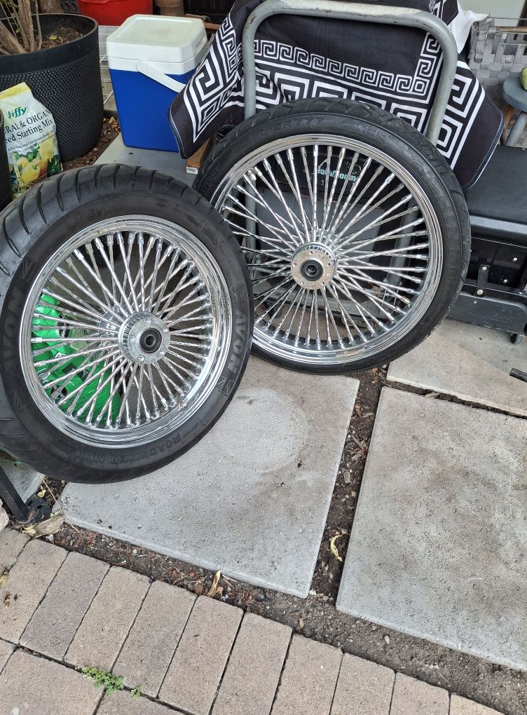 Combo cast laced 21 in. front wheel and 18 inch rear wheel for sale