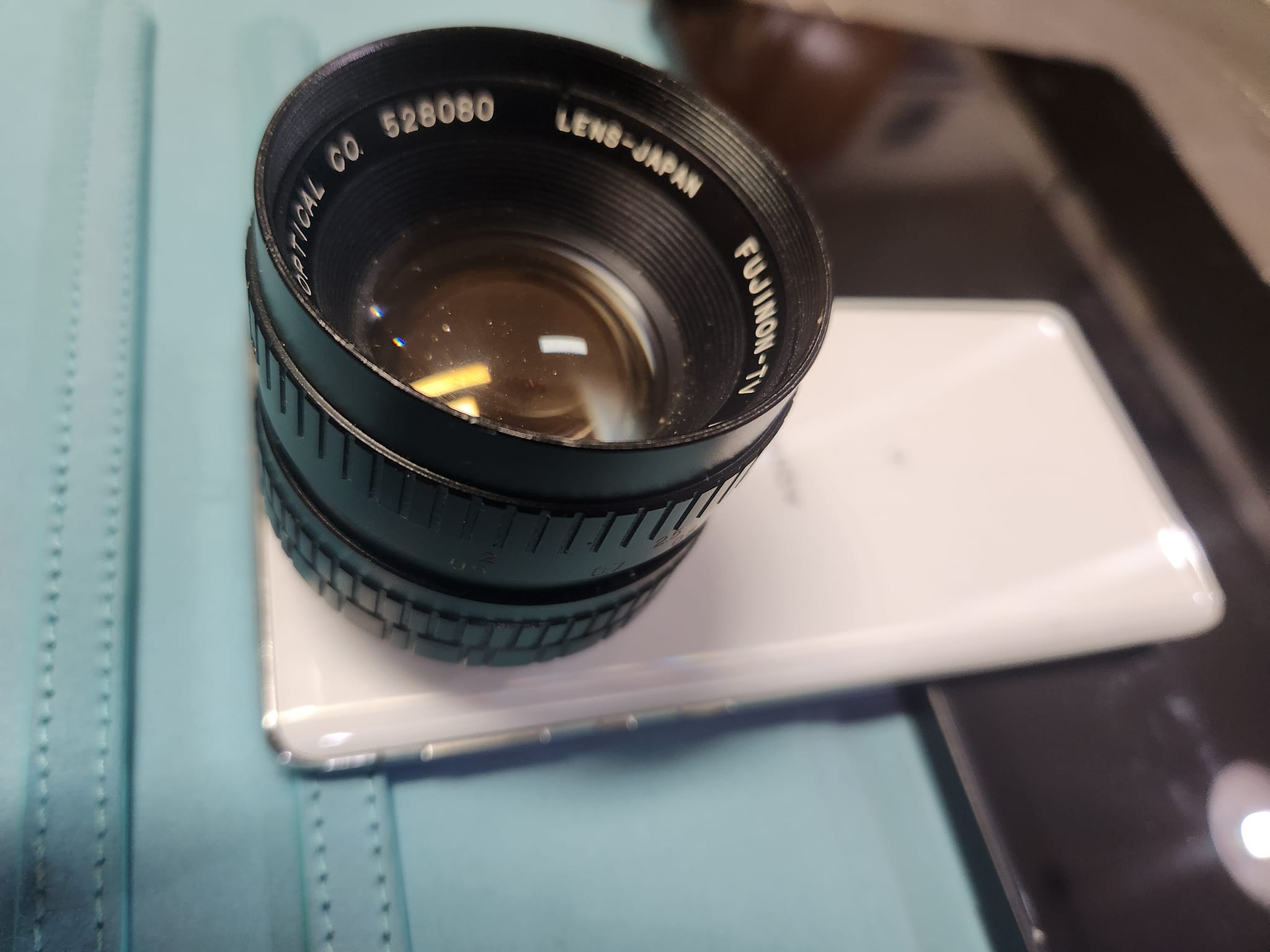 Fujinon 25mm f/0.85 C-mount lens on phone