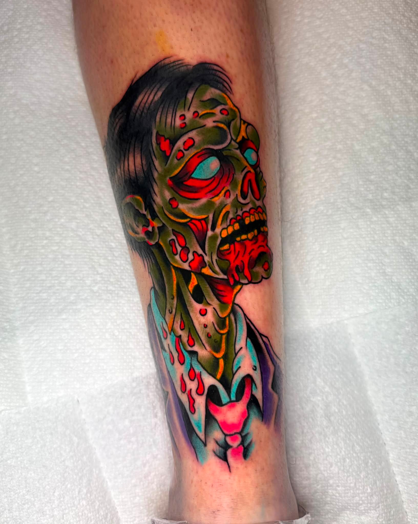 Zombie tattoos from flash sheet on shins
