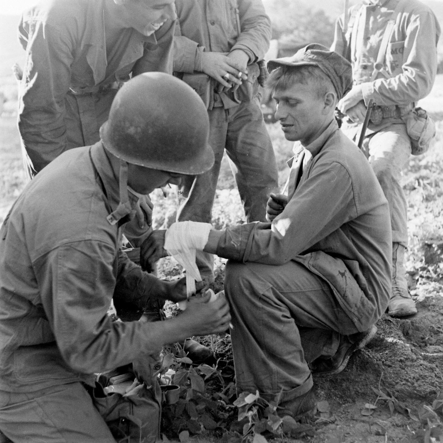 world-wounded-marine-gets-bandaged-on-okinawa-april-may-1945-life