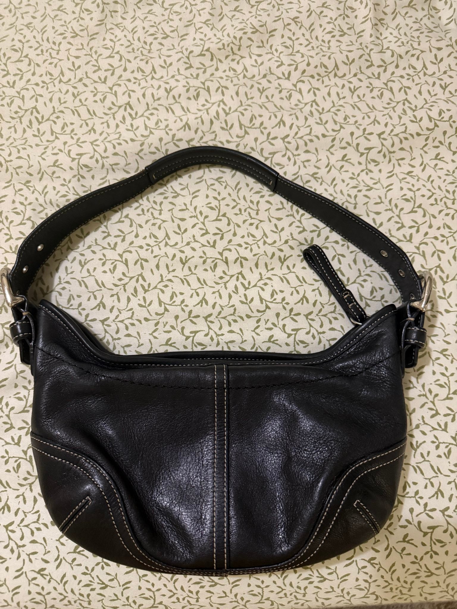 Would anyone want to trade this black mini hobo shoulder bag for 