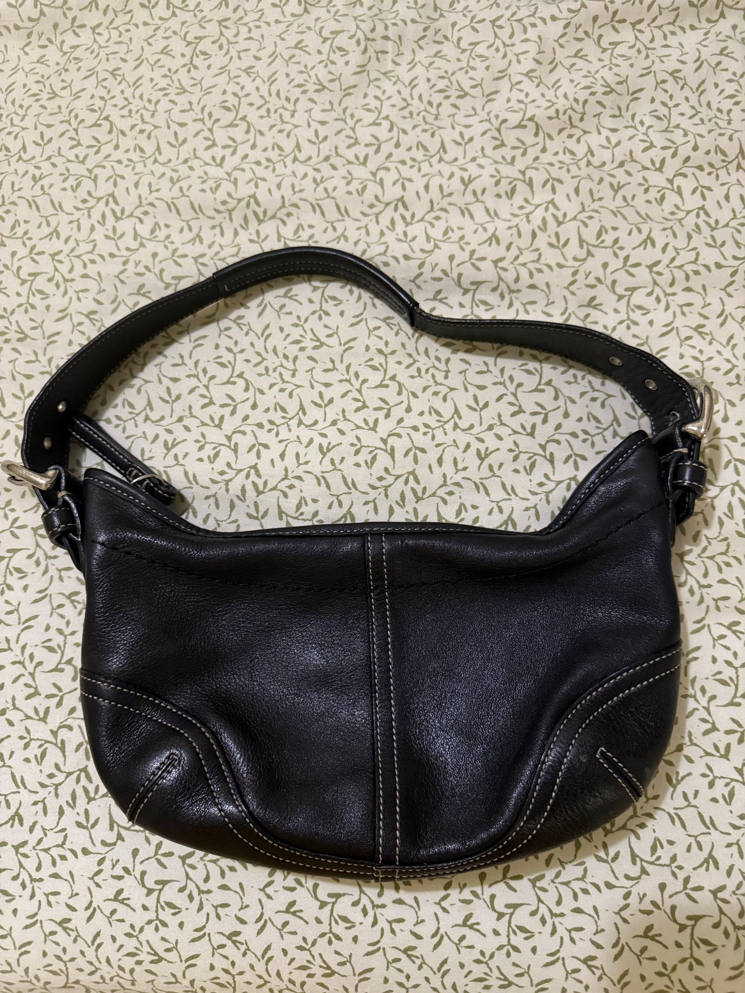 Would anyone want to trade this black mini hobo shoulder bag for 