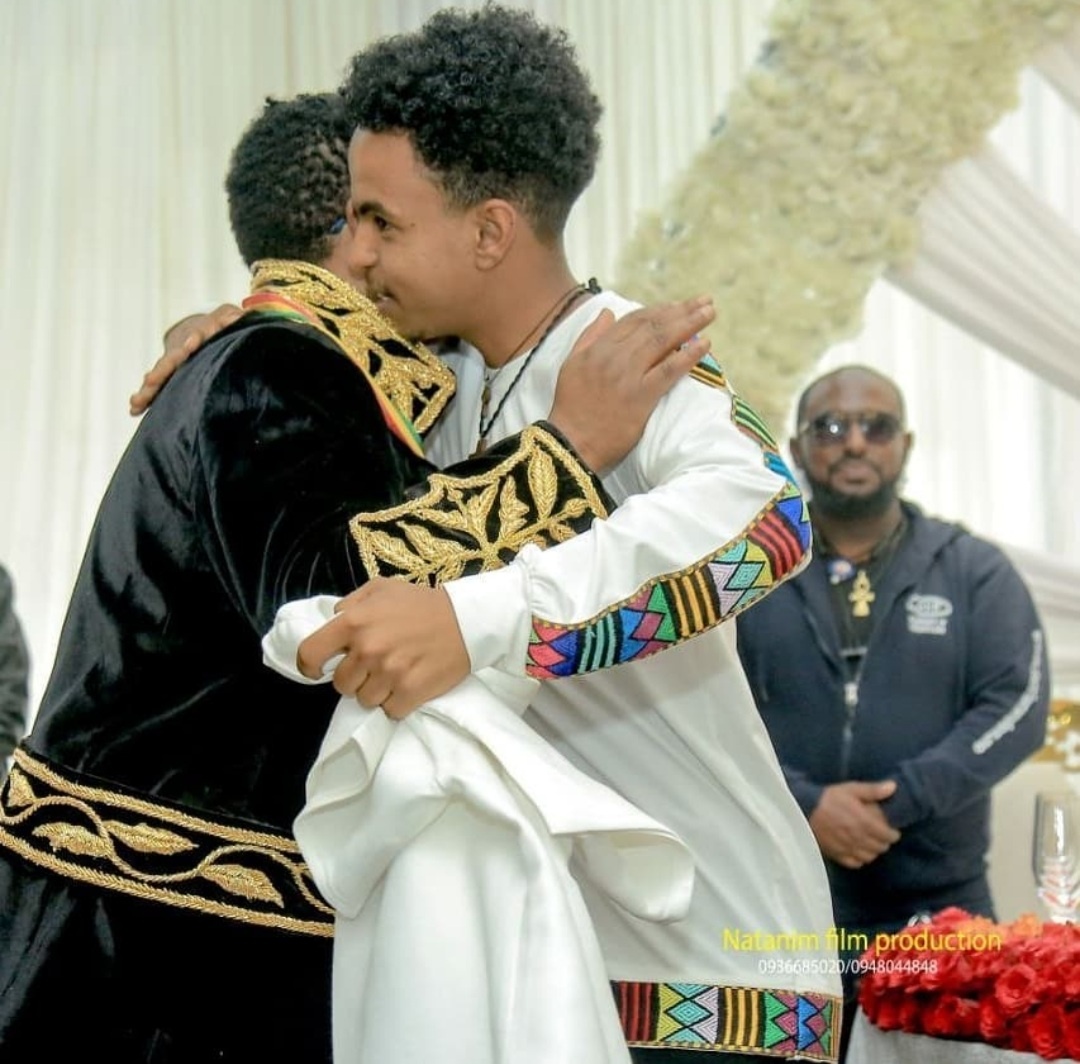 ሙሽራ ሐበሻ ልብስ | ወርቃማና  አረንጓዴ በእጅ የተሰራ የሠርግ ልብስ main image 1