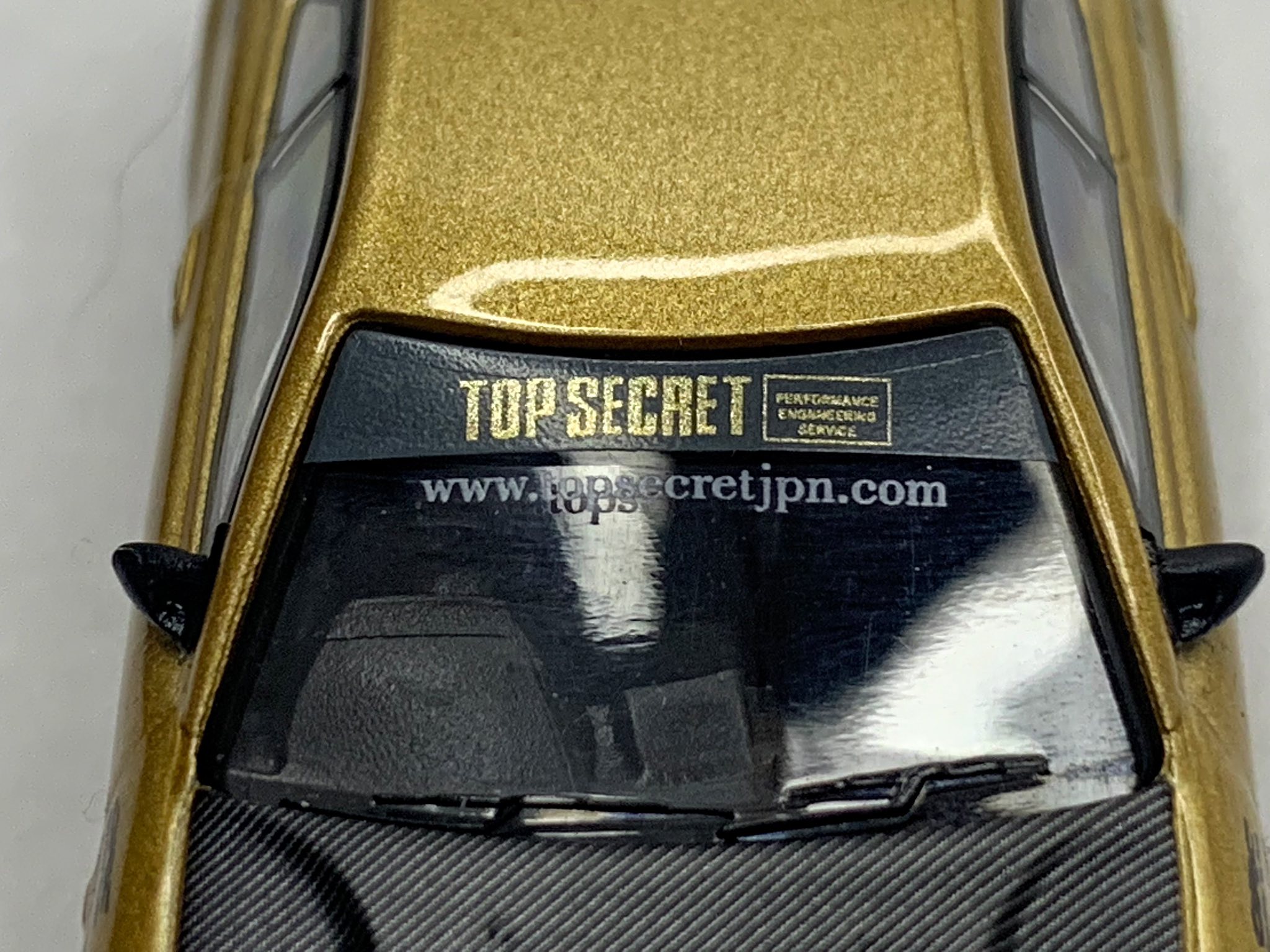 Mini GT's Top Secret Gold Chrome Set at Tokyo Auto Salon 2025