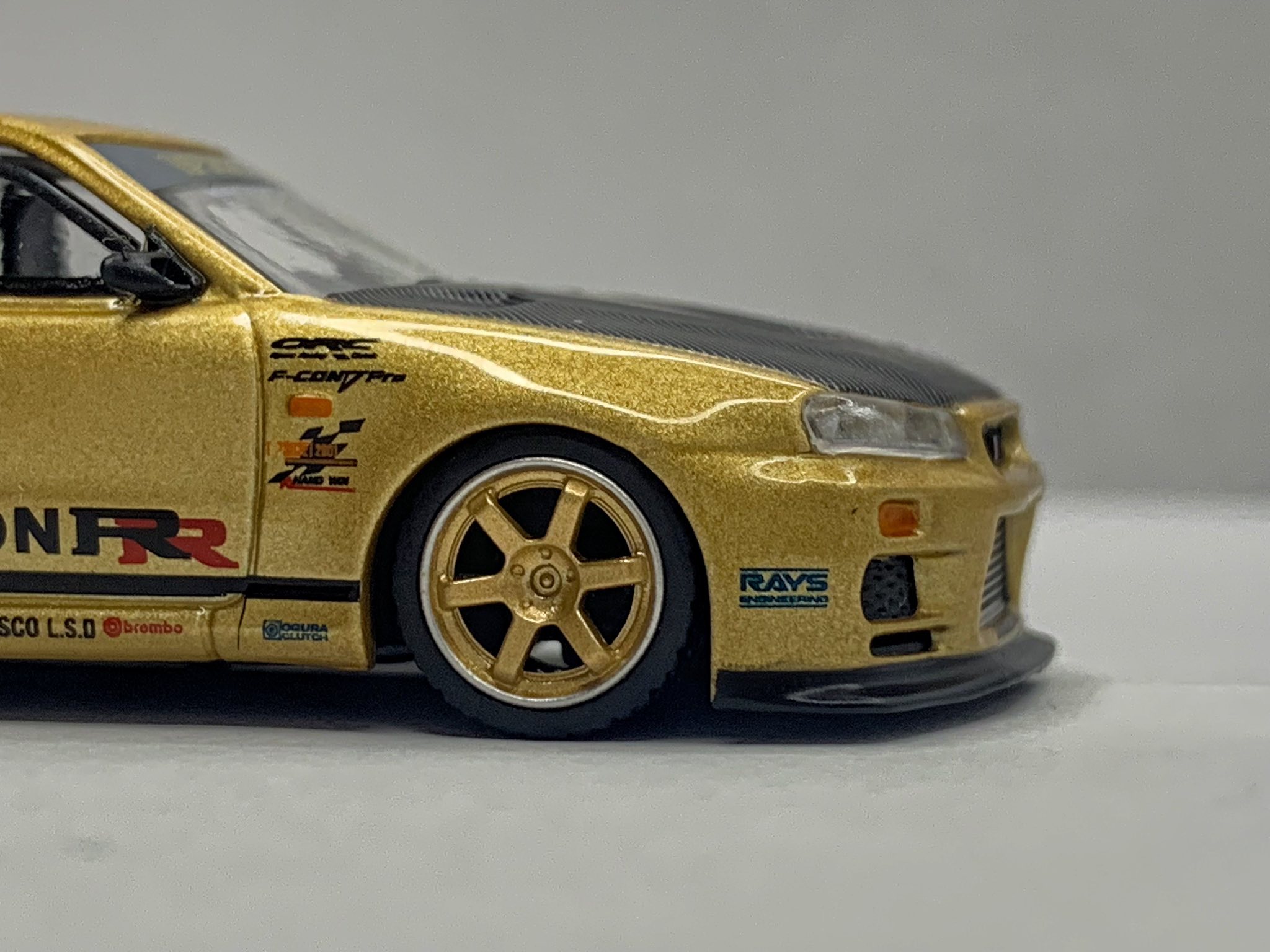 Mini GT's Top Secret Gold Chrome Set at Tokyo Auto Salon 2025