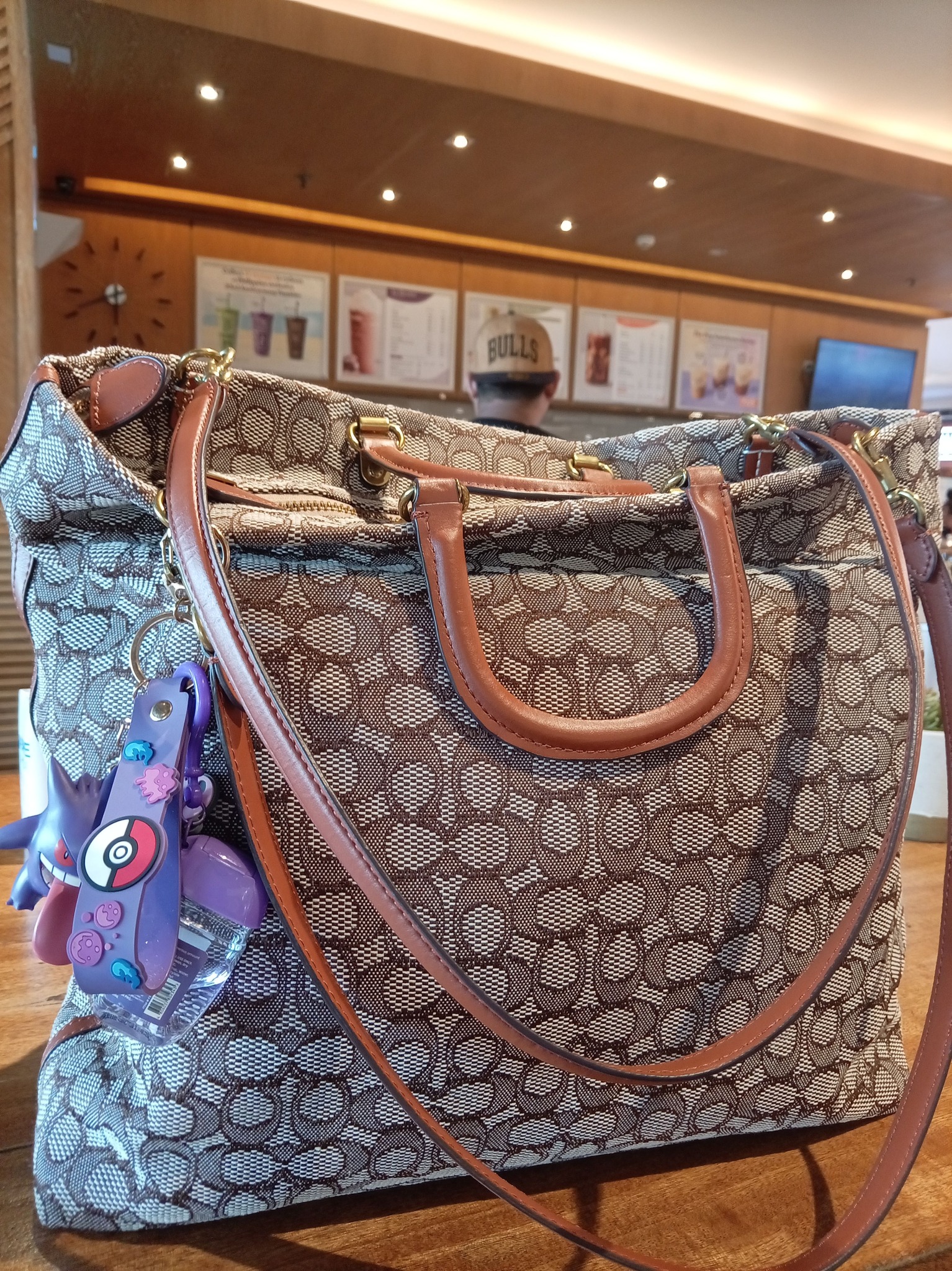 Vintage Coach bag with signature pattern as 20-year-old
