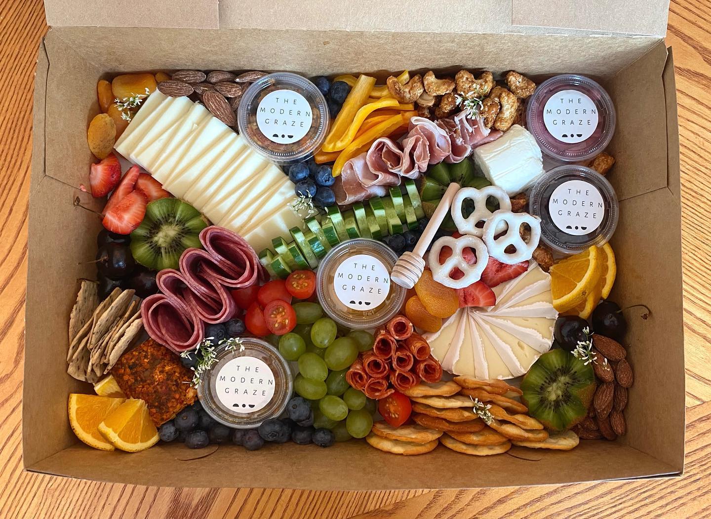 The Modern Graze - A medium box with a K I C K⚡️Mango Chili Goat Cheese ...
