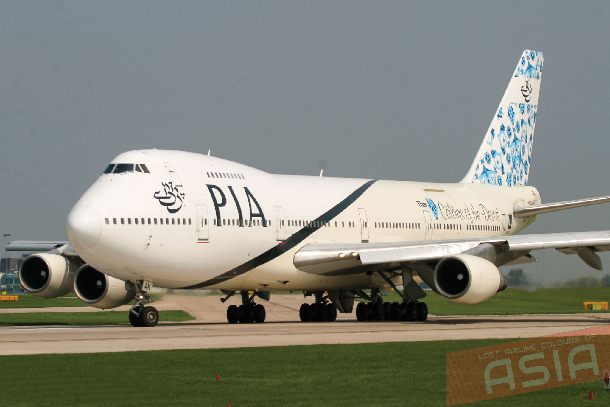 A Pakistan International Boeing 747-200B. Wearing the colourful