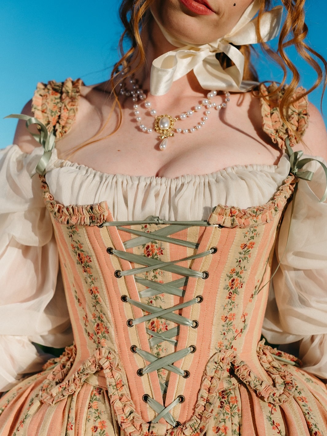 I'm drooling over the rococo pink 18th century stays and bustle skirt 😍💖 Pair this with the ivory chiffon chemise and plaid bustle skirt for extra drama 🌾 Model Emily O'Dette #rococo #