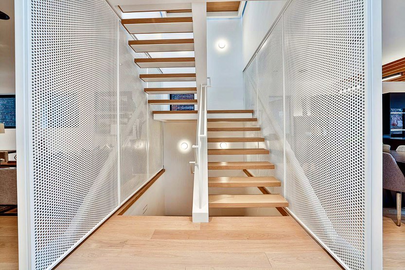 Stairhaus Inc. - This stair spans 3 floors and has a...