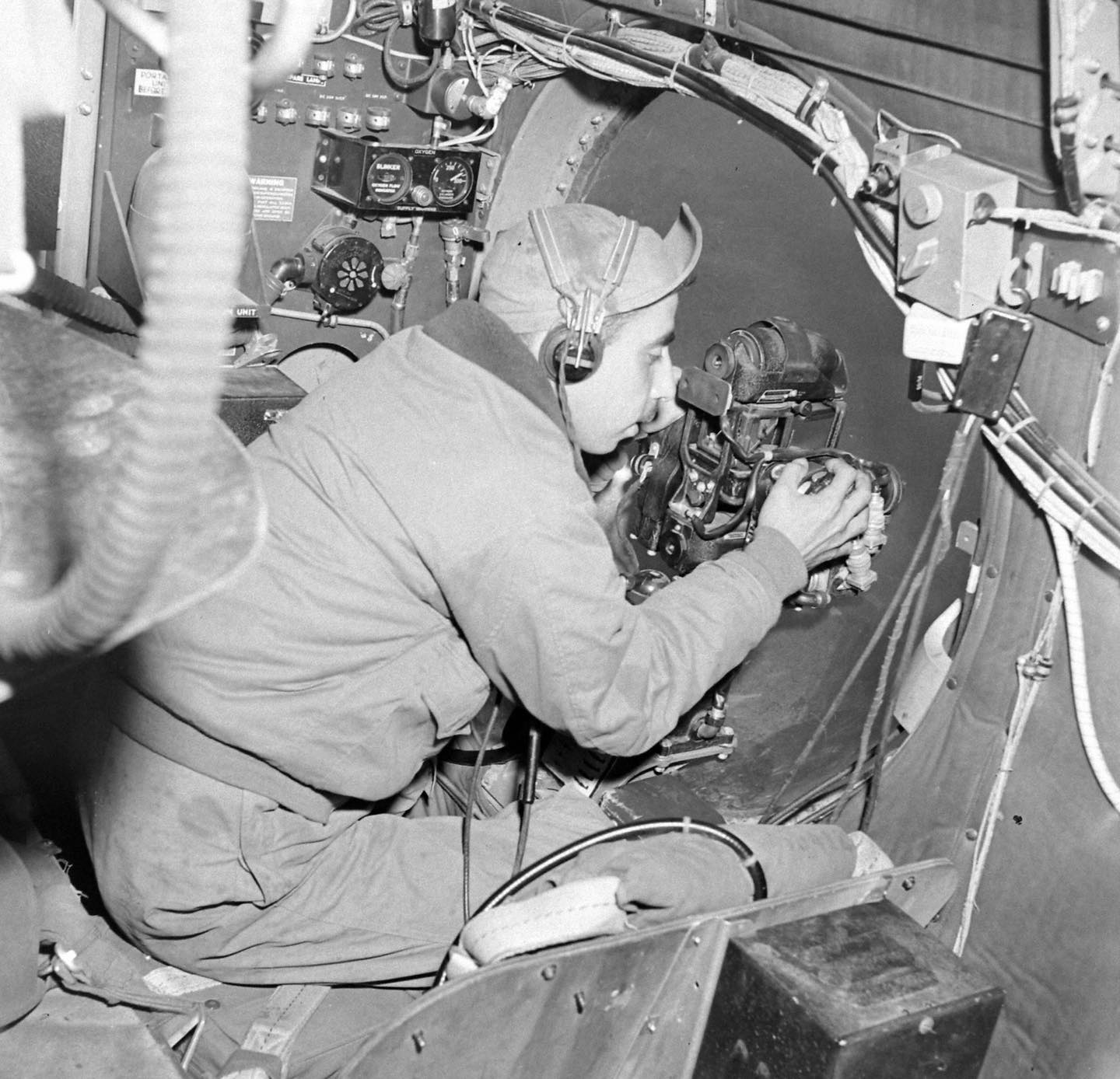 World - USAAF B-29 “waist gunner” watches for Japanese fighters while ...