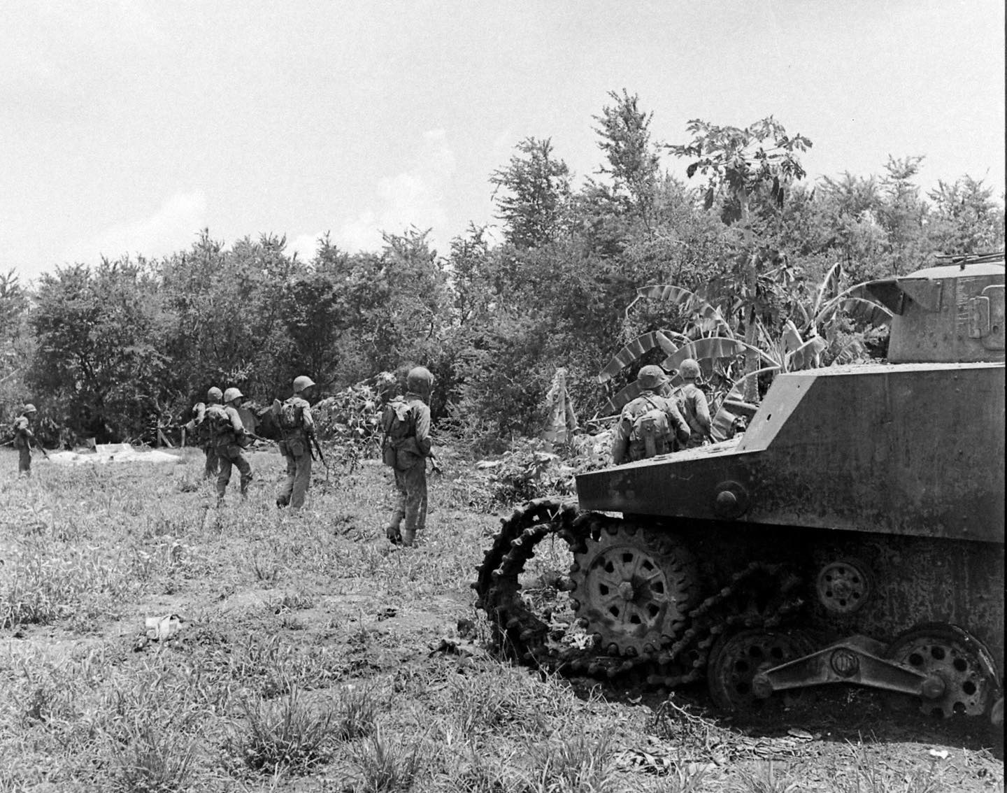 World - Marines advance past a knocked-out Japanese Type 2 Ka-Mi tank ...