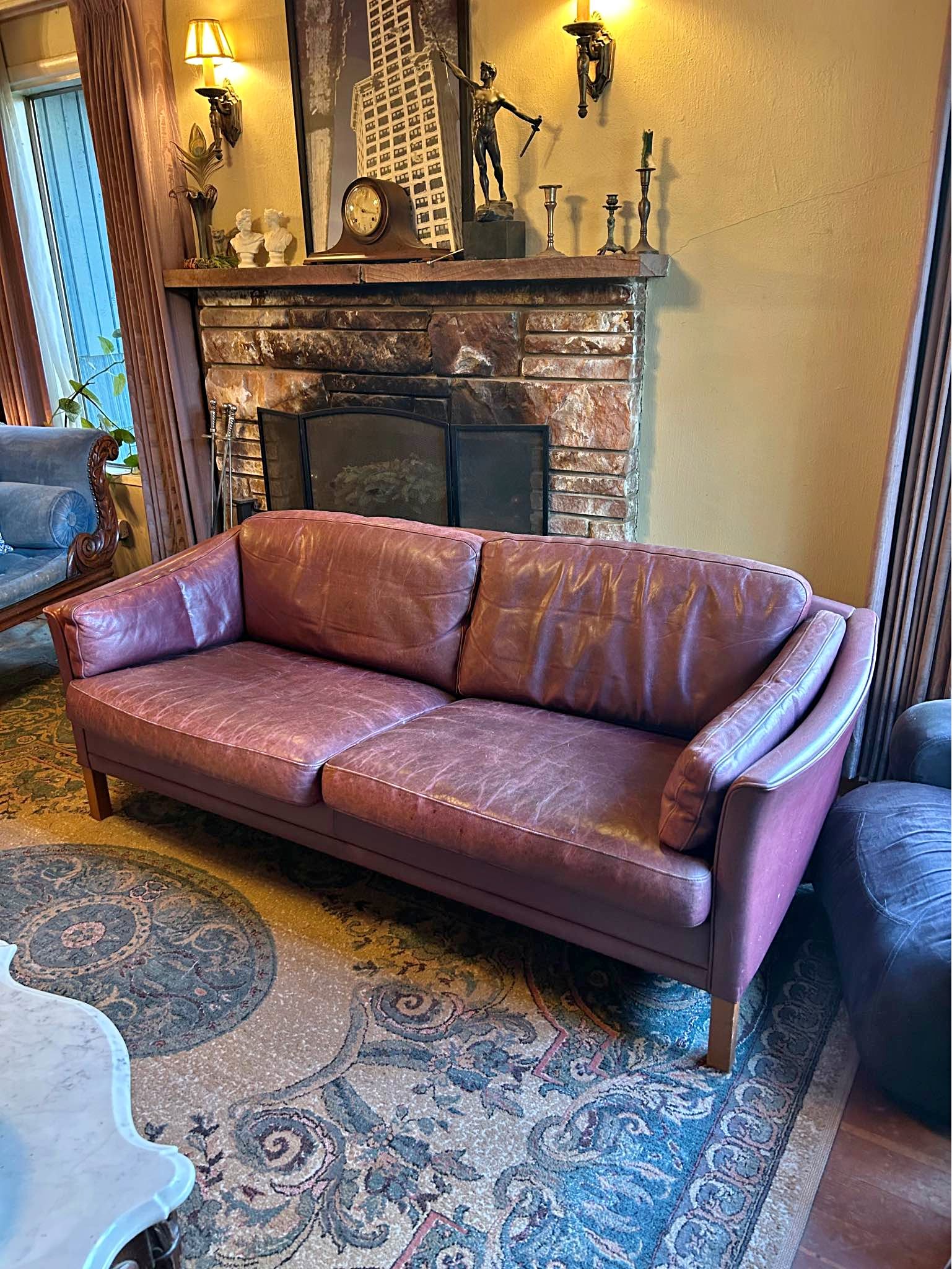 Leather couch. Fair condition very comfortable. No rips or treats in