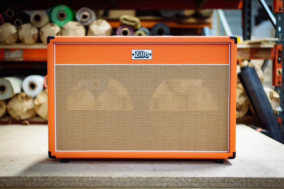 Studio Pro 2x12. Rough brown tolex with basket weave grill, white