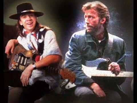Eric Clapton and Stevie Ray Vaughan (hatless)