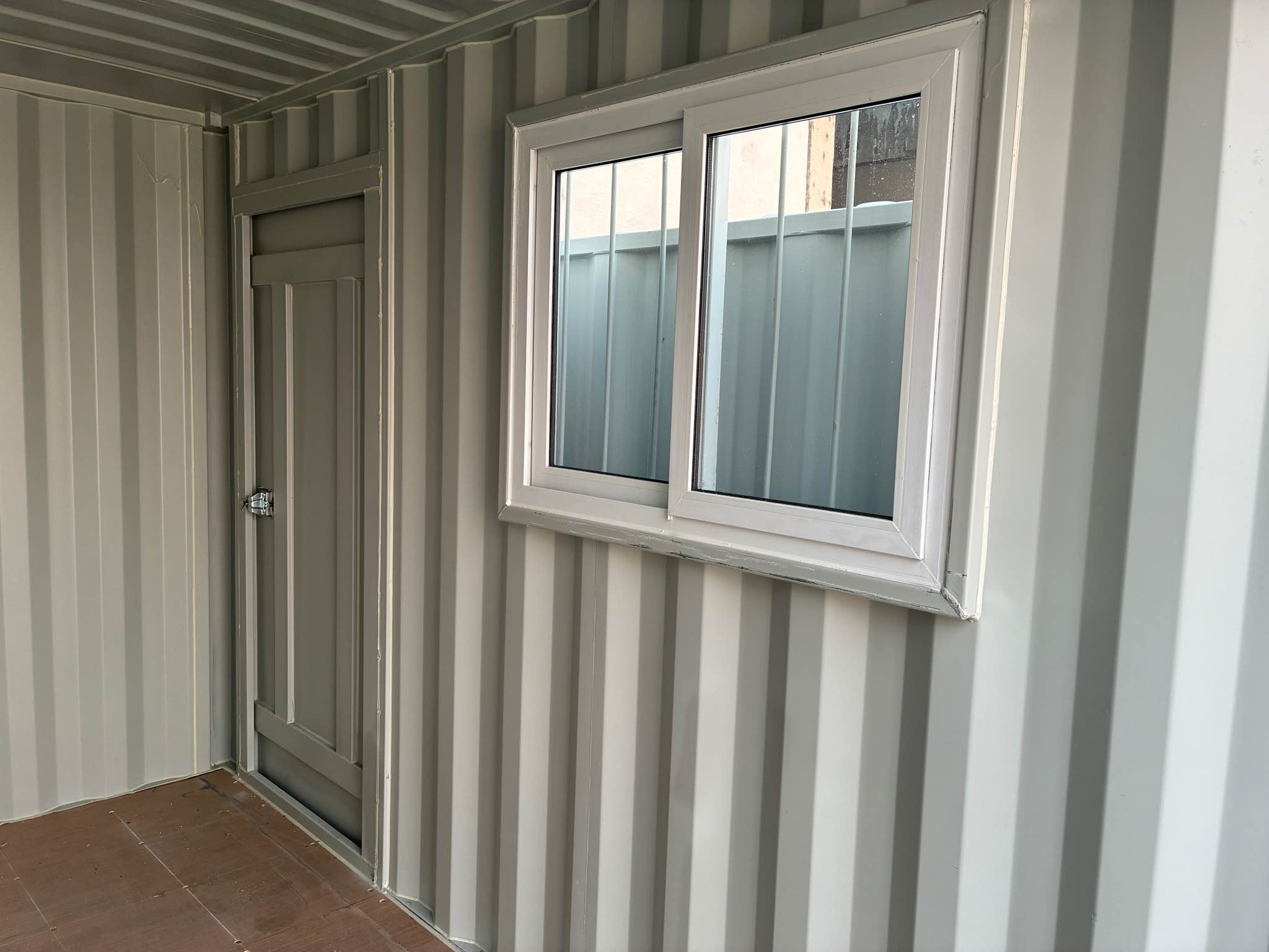 New 1 trip containers have landed, light gray, wind & water tight