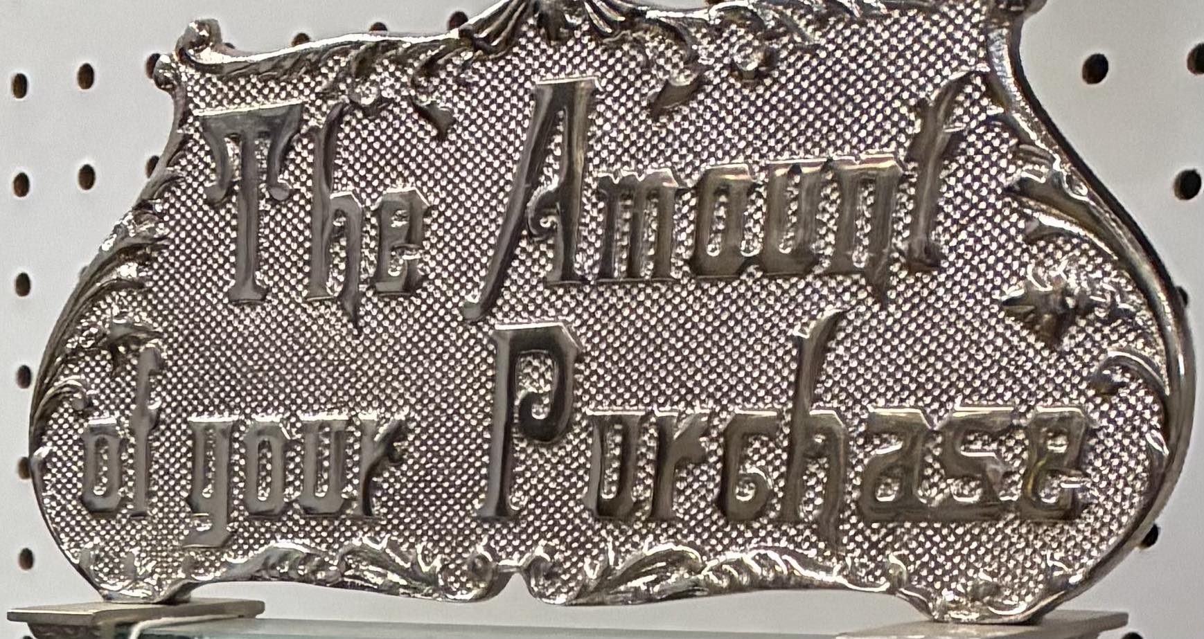 Identifying original and reproduction top signs for cash registers