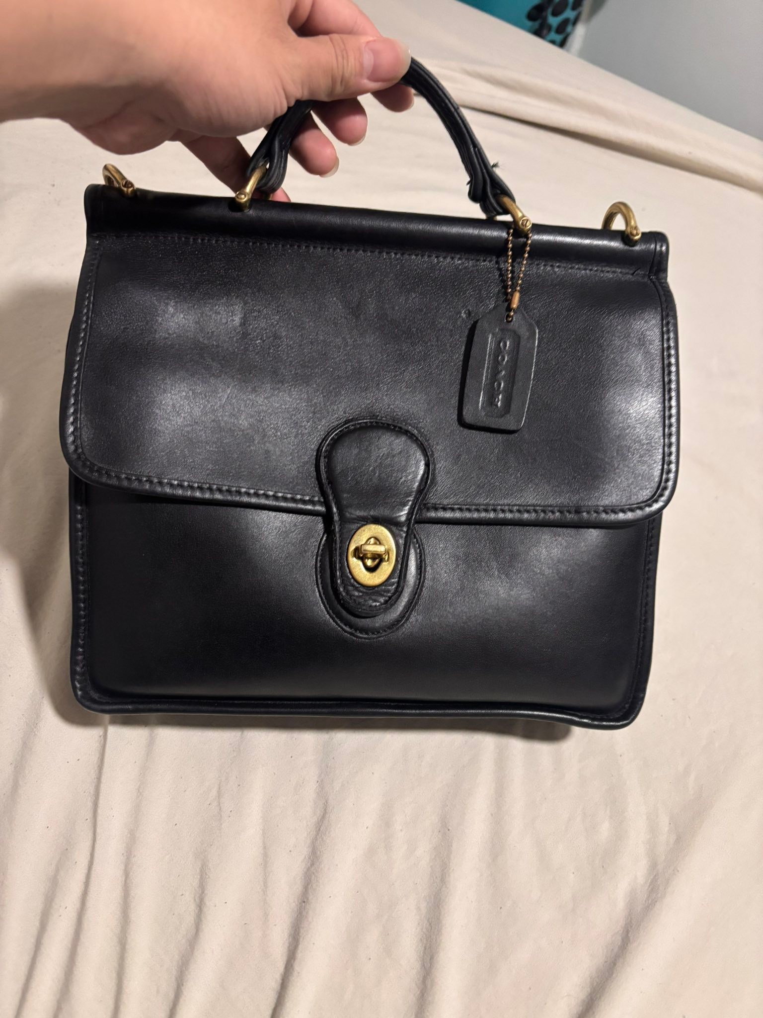 What is the current price of a black vintage Coach Willis 9927?