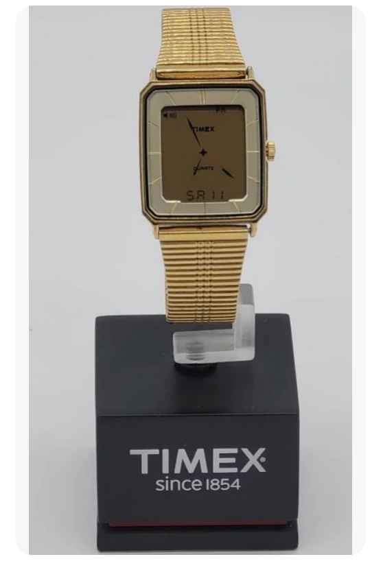 A vintage Timex rotating display case from the 1970s. It is