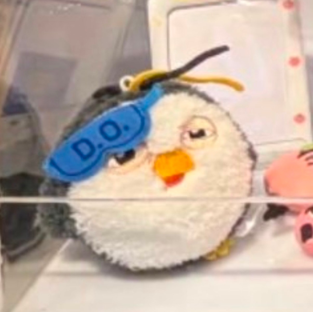 Zzirang-e plush keyring with D.O. eye mask