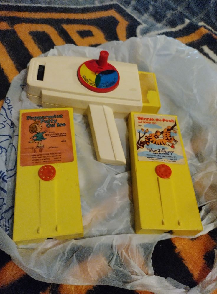 Fisher Price music box TV from the 60s. Complete wth Peek-a-boo screen