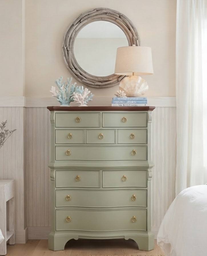 light sage green dresser From dark wood to coastal dreams! 🌿✨ ​This gorgeous needed some TLC, including custom repairs using handmade moulds to restore its missing details. We painted the base in a soft sage green chest of drawers