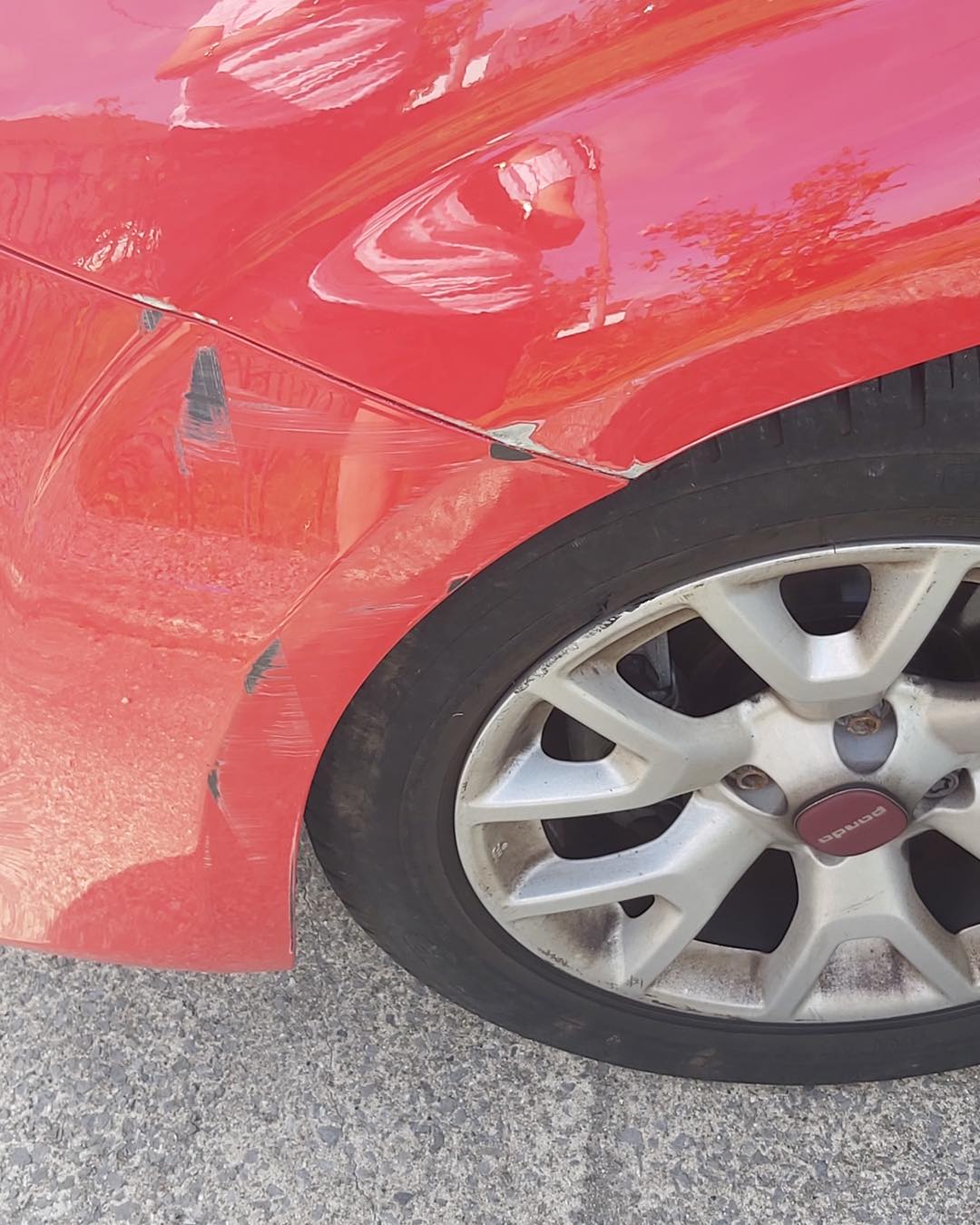 Scratch 22 - A scuffed up front wing/bumper corner from...