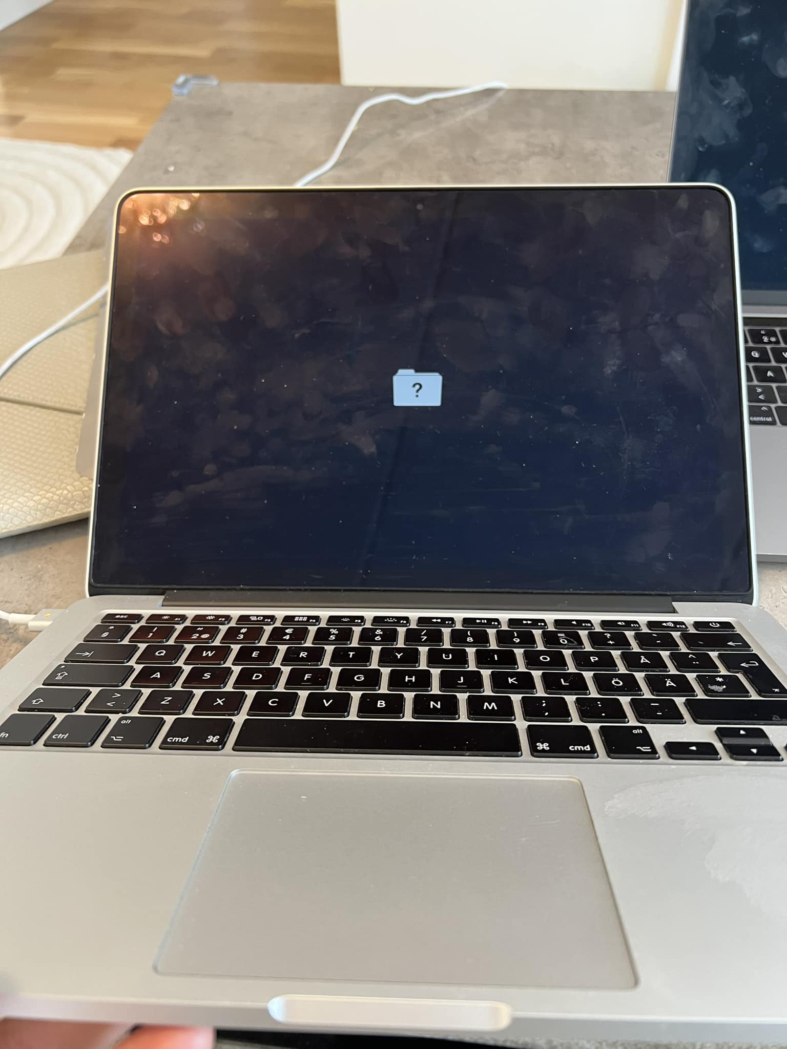 Macbook pro blinking three times and beeping