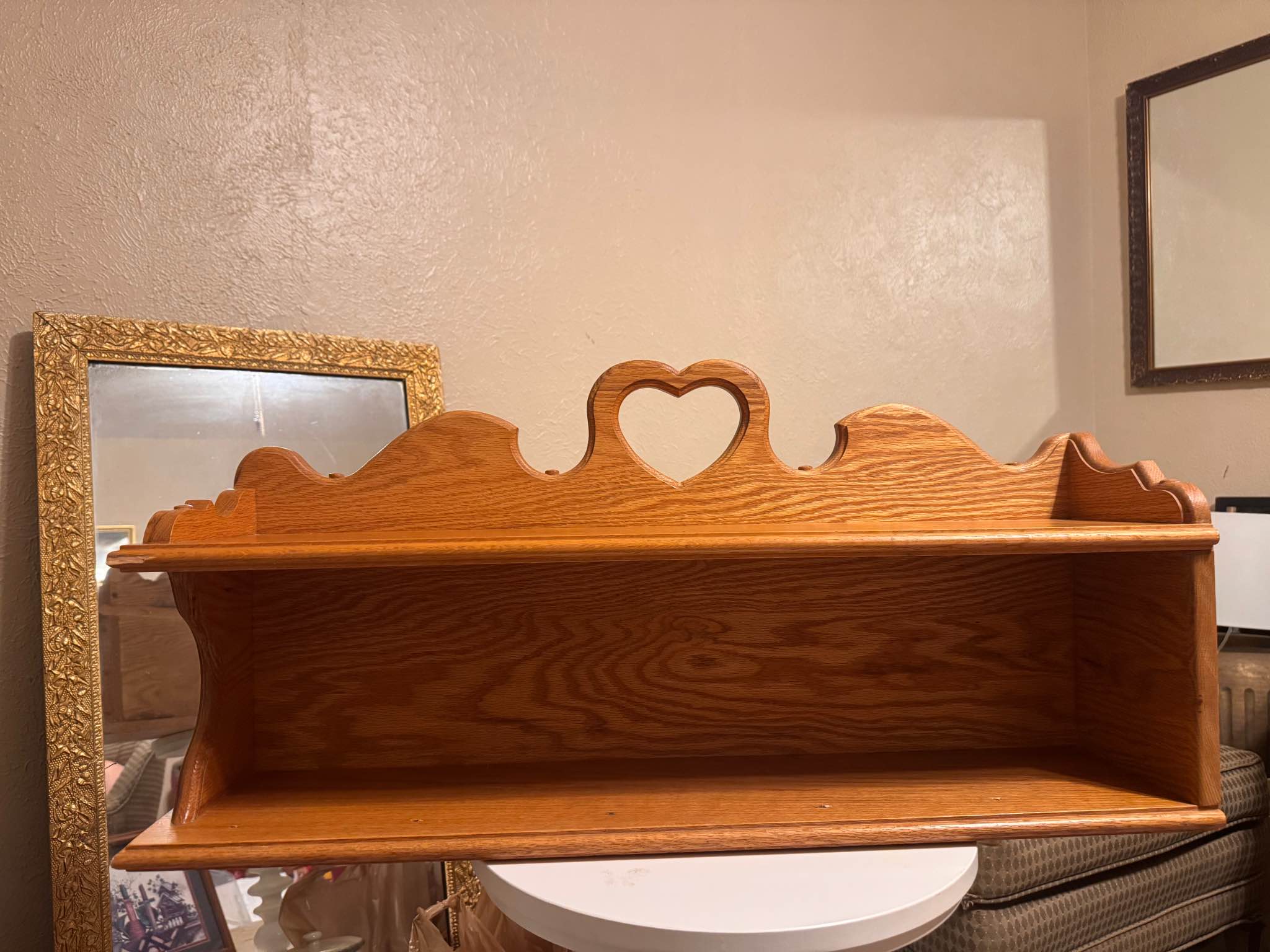 Wooden heart shelf. One side is different than other, but still