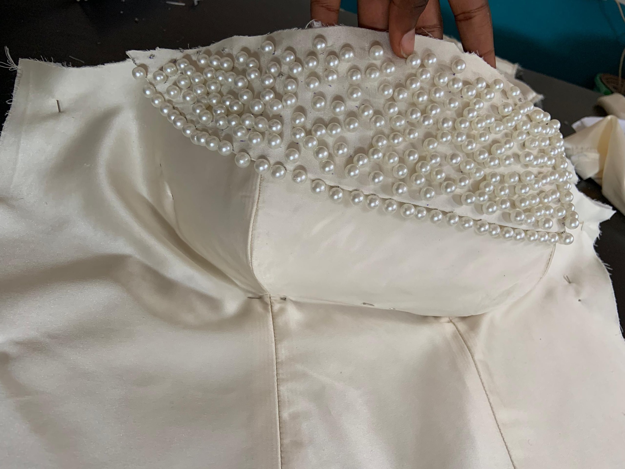 How to fix and prevent beads from falling off a dress?