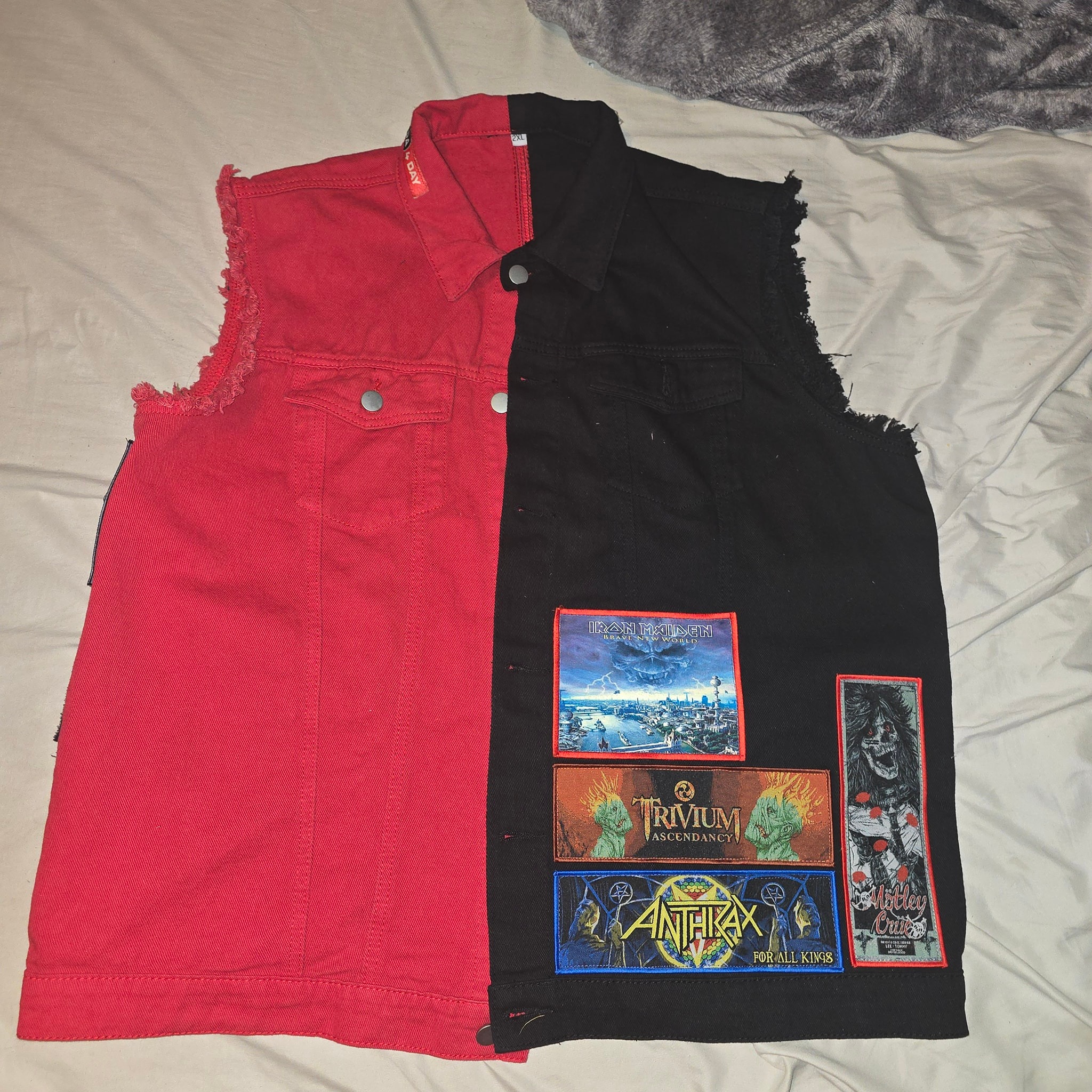 Battle vest with concert patches from bands seen since 2024