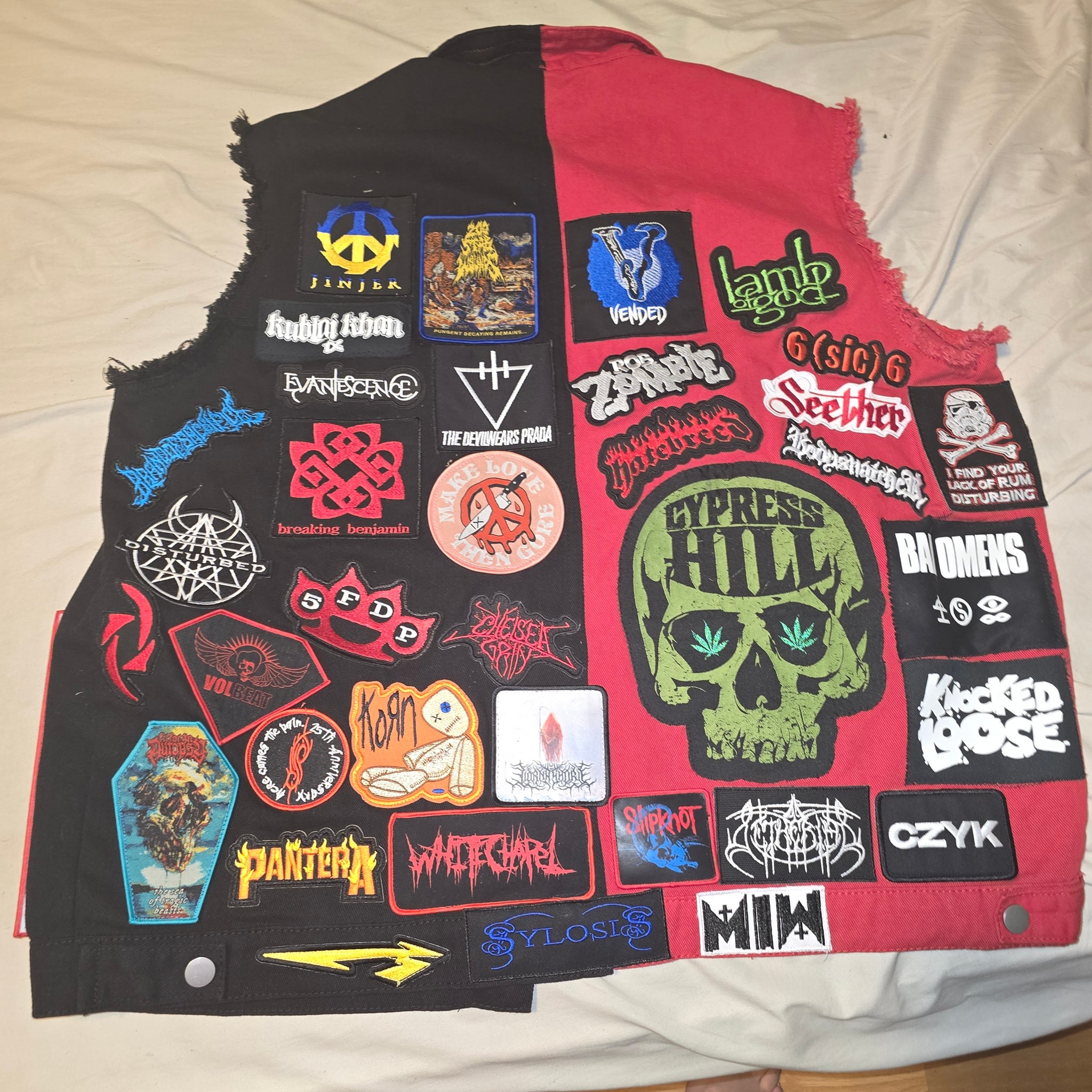 Battle vest with concert patches from bands seen since 2024