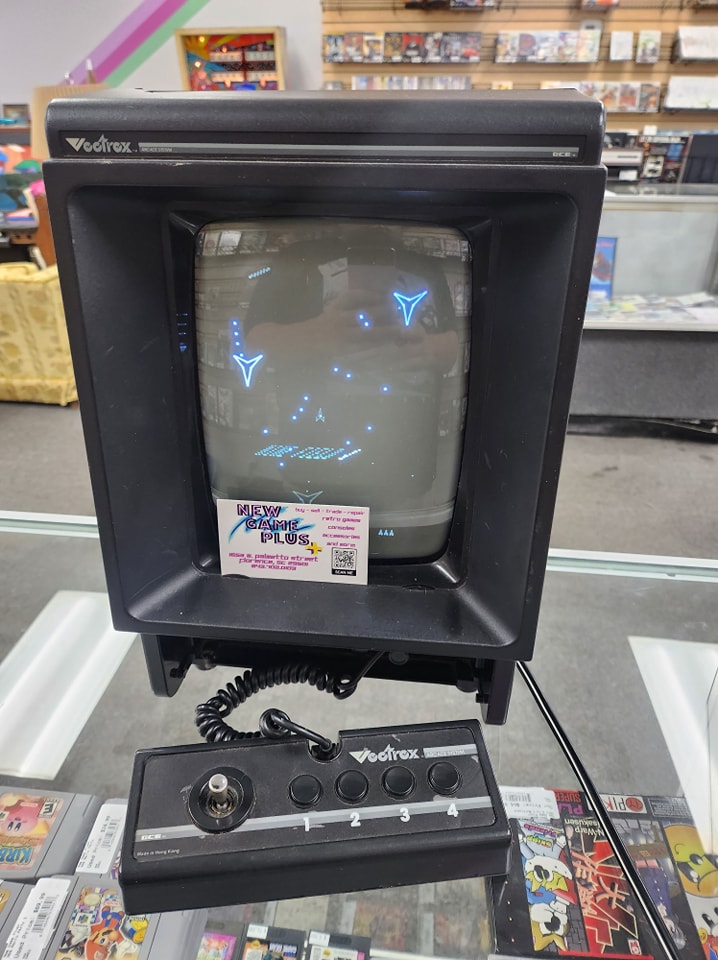 Unique Vectrex video game console with multi-cart overlay