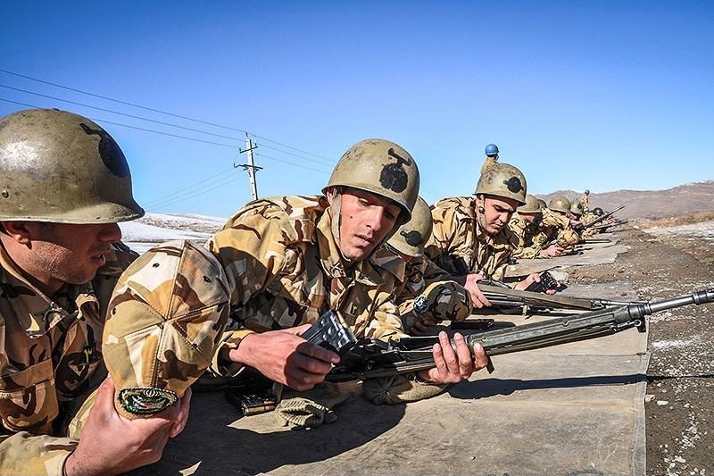 Philip's - Iranian Islamic Revolutionary Guards are pictured training ...