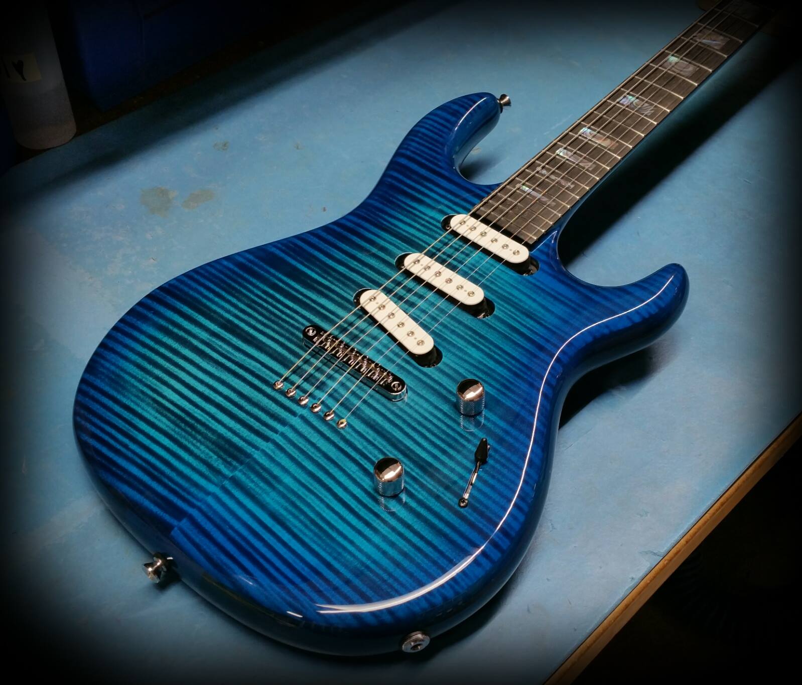 Kiesel Guitars - Dc127 in deep aquaburst over flamed maple top