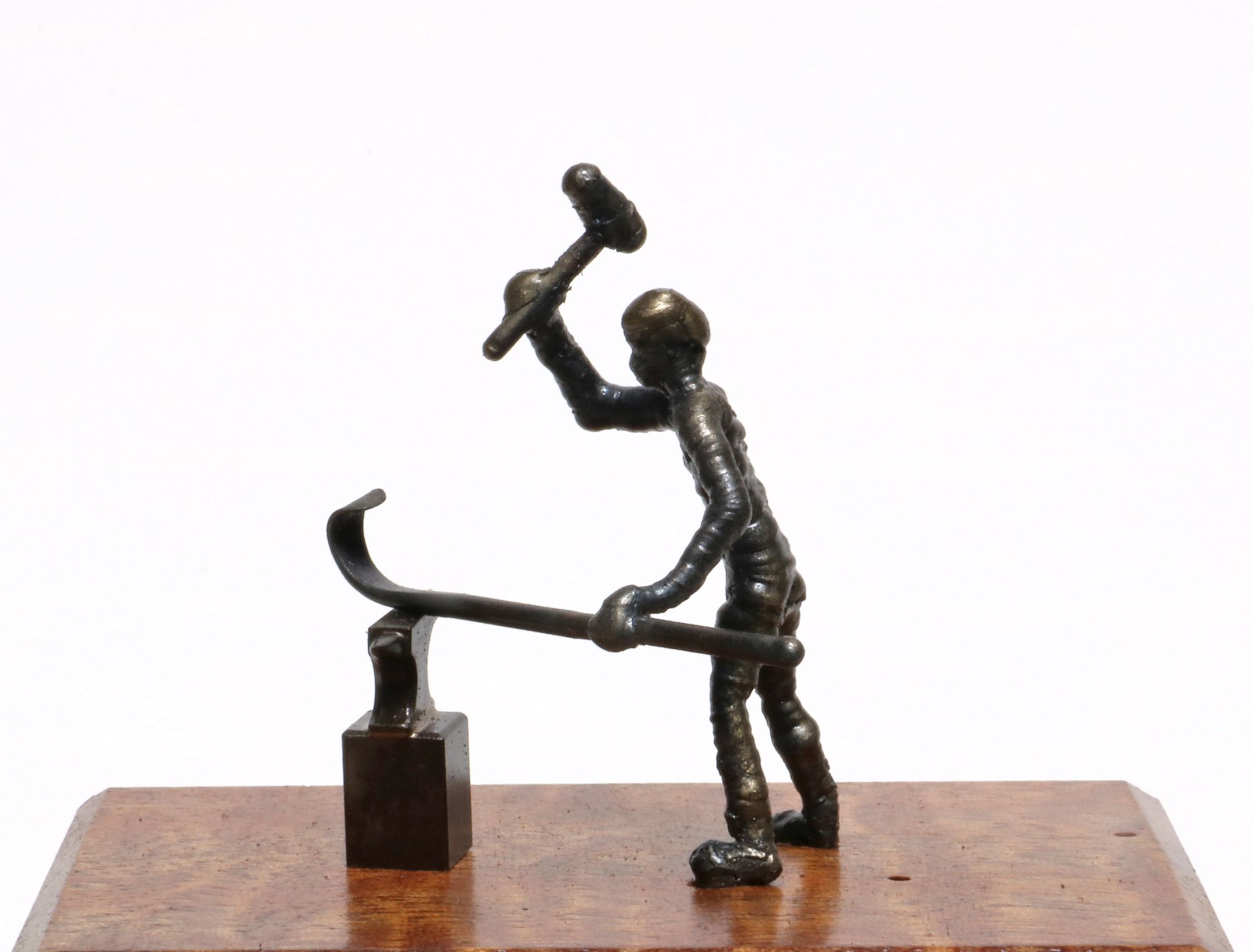Peter Renzetti's Puddled... - The Village Blacksmith