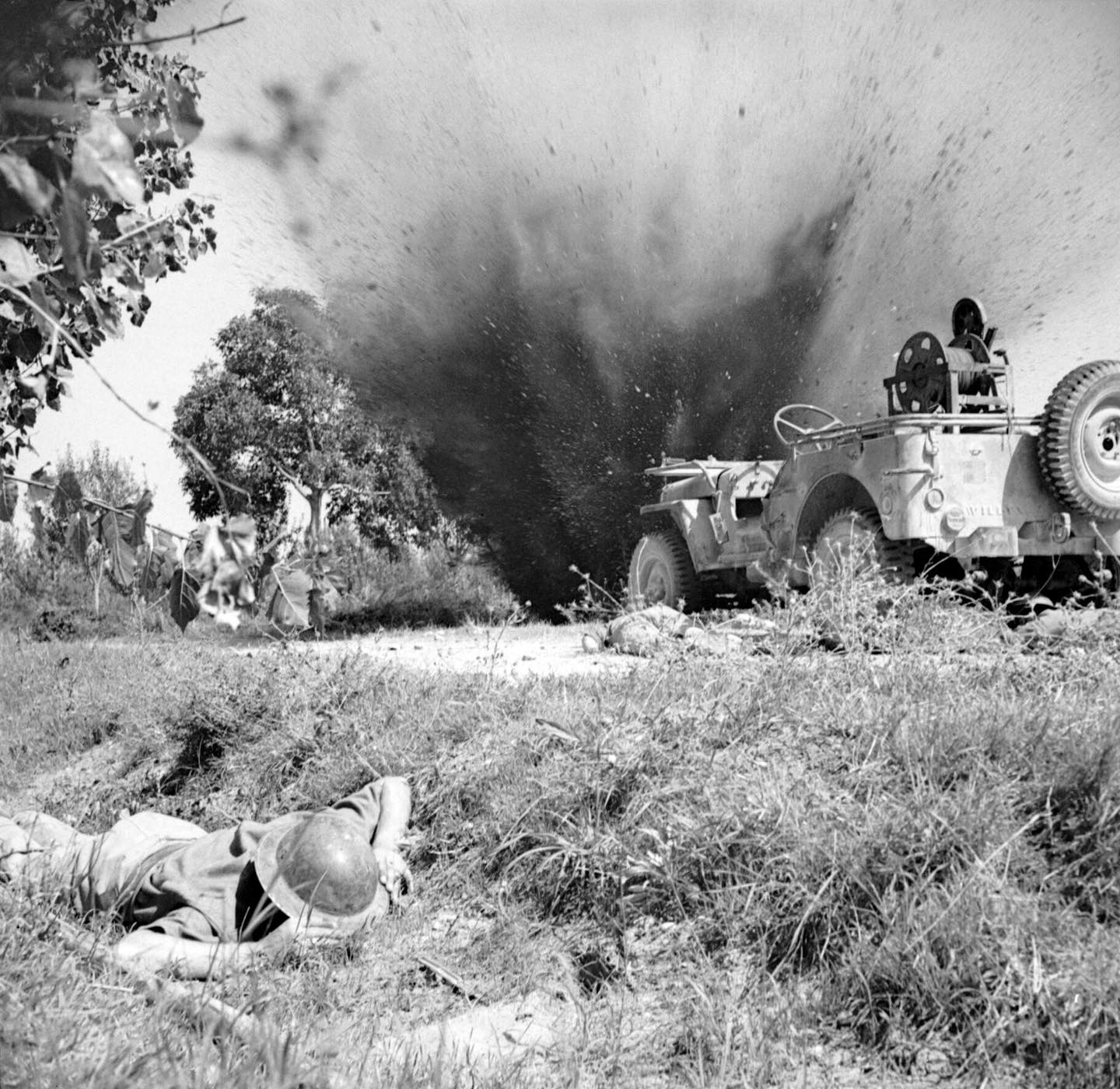 World - British Signallers with X Corps take cover as an enemy mortar ...