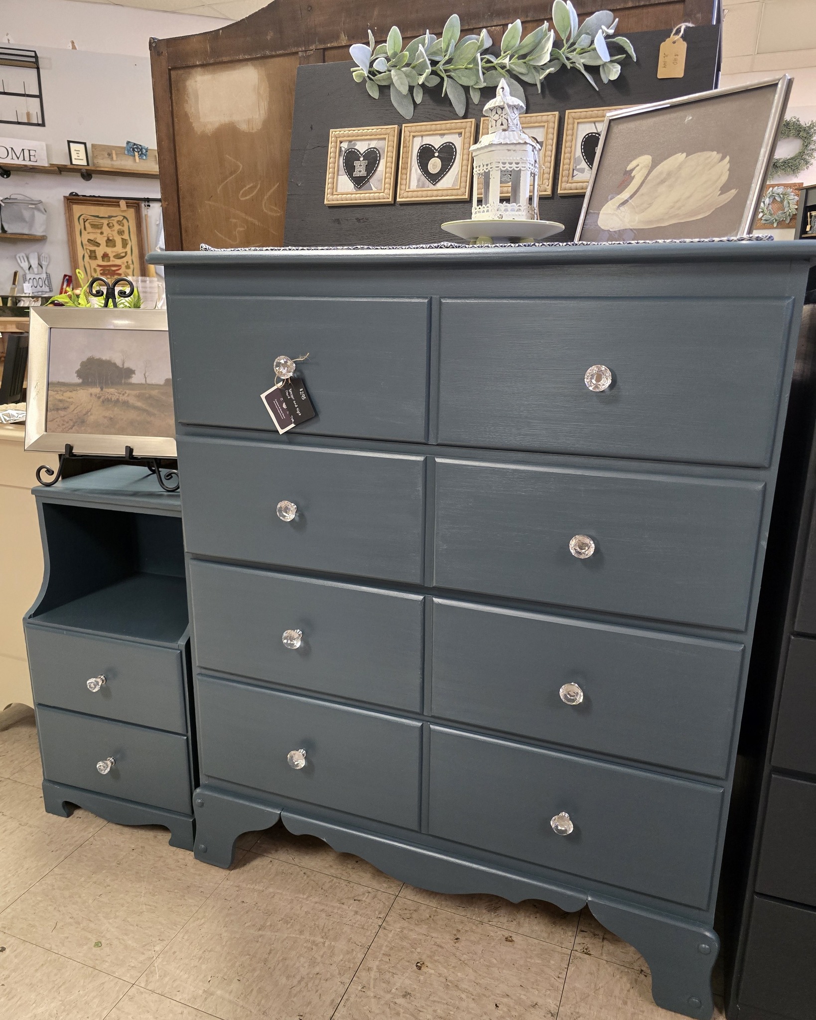 I do love glass knobs. They add a touch to furniture that gives it an elevated look! This night stand and dresser set is a pretty blue! Have a senior heading to